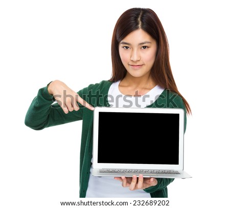 Woman finger point down to the blank screen of computer