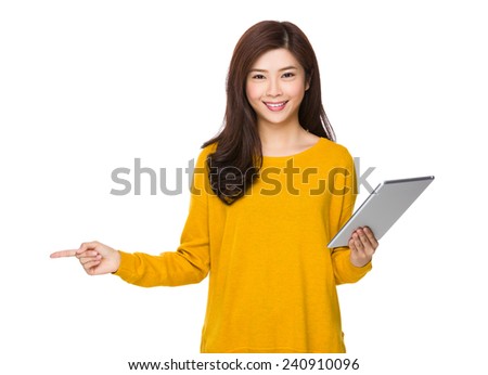 Woman use of tablet and finger point aside