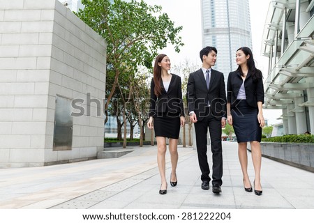 Business team mate walking on the street