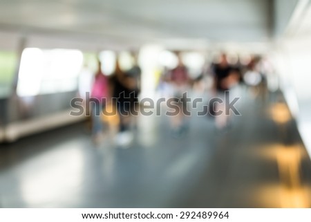 Crowded of people in corridor with blur background