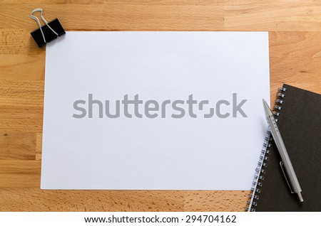 Working desk with plain paper for adding some information