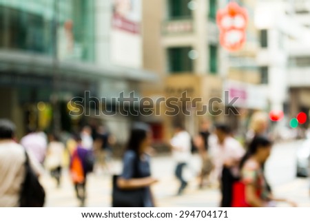 Bokeh view of Crosswalk and pedestrian at street in hong kong