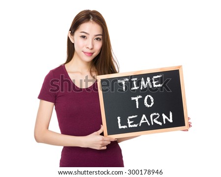 Young woman with blackboard showing phrase time to learn