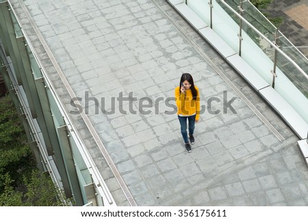 Top view of woman talk to cellphone