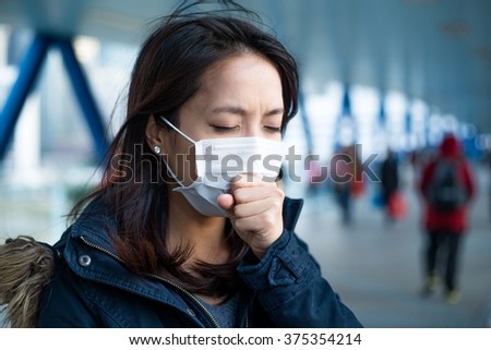 Asian Woman feeling unwell at outdoor