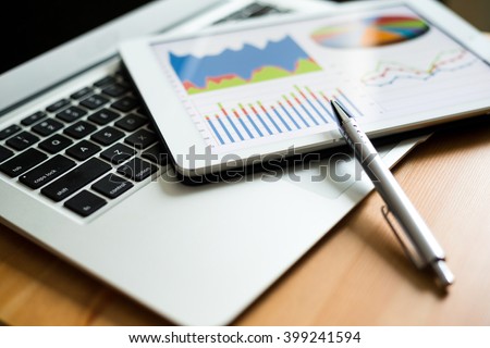 Business analytic with tablet pc and laptop computer