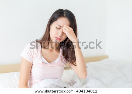 Woman feeling eye pain
