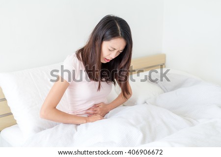Asian Woman suffer from stomach pain