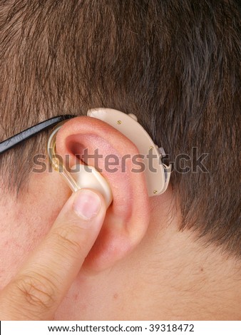 Man wearing hearing aid, close up
