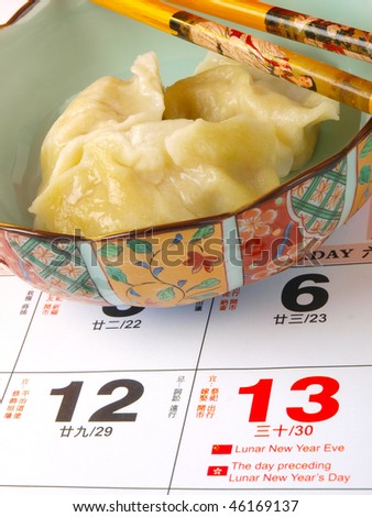 Chinese New Year Dumplings. Calender illustration the start of the Chinese new year. Close up