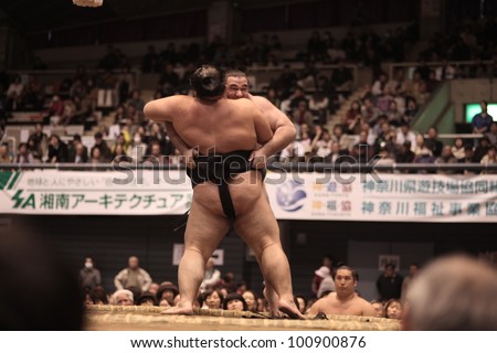TOKYO - APRIL 7: Unidentified sumo wrestlers in a tournament on April 7, 2012 in Tokyo, Japan. Even though Sumo is Japan\'s national sport, most professional wrestlers are foreigners