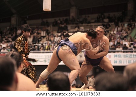 TOKYO - APRIL 7: Unidentified sumo wrestlers in a tournament on April 7, 2012 in Tokyo, Japan. Even though Sumo is Japan\'s national sport, most professional wrestlers are foreigners