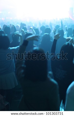 Unidentified young Japanese people partying at an unknown concert in Tokyo, Japan