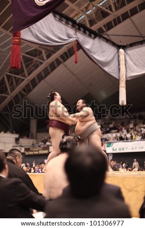 TOKYO - APRIL 7: Unidentified sumo wrestlers during a tournament in Tokyo, Japan on April 7, 2012. Even though Sumo is Japan\'s national sport, most professional wrestlers are foreigners.