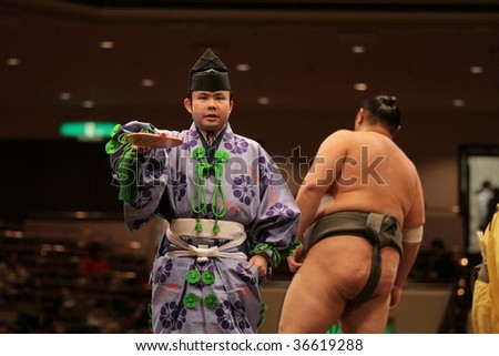 TOKYO - JANUARY 20: Judge (L) calls it quits after a fight in the Tokyo Grand Sumo Tournament January 20, 2009 in Tokyo, Japan.