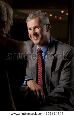 Man Talking with a Woman in a Restaurant