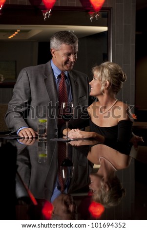 Man and a Woman Together in a Bar