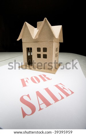 Model House with For Sale Sign