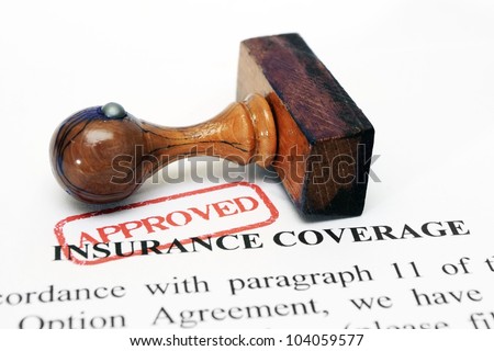 Insurance coverage and wooden stamp