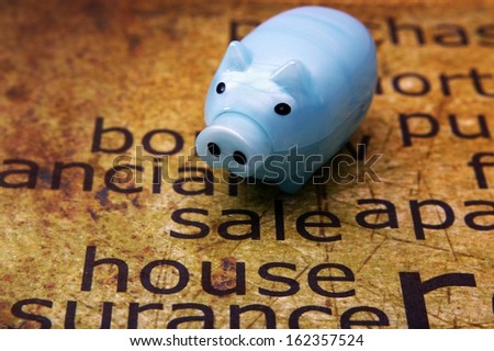 Sale house and piggy bank concept