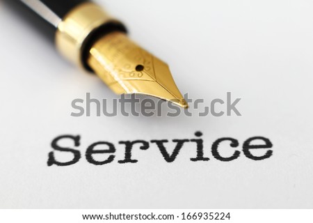Fountain pen on service text