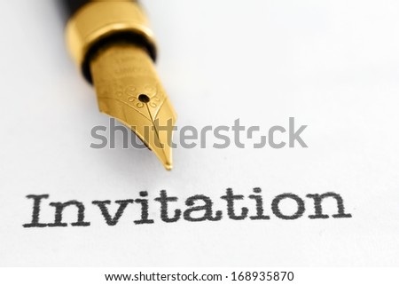 Fountain pen on invitation  text