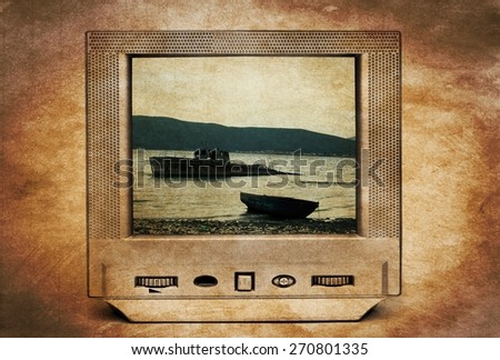 Old rusty abandoned ruined boat on TV