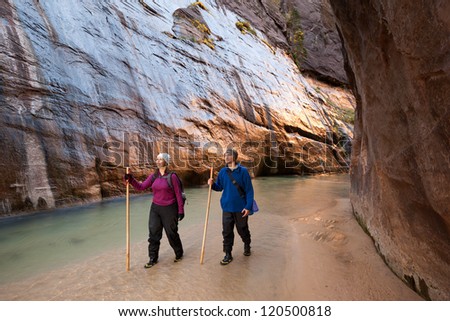 Hiking the Narrows in Zion National Park, Utah.