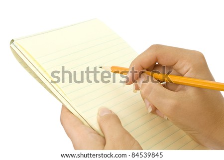 Notebook in hand isolated on white background