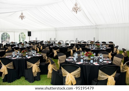 stock photo Wedding Marquee in Black and gold theme