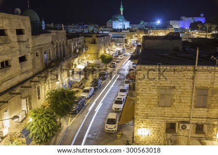 AKKO, ISRAEL - OCTOBER 22, 2014: Streets of ancient city of Akko at night. The place changed very little in several hundreds of years.