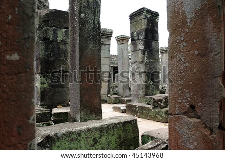 Ancient columns on the second level in the temple of Bayon. Angkor. Siem Reap. Cambodia.