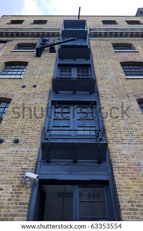 Old warehouse converted to block of flats in Docklands. London. UK.