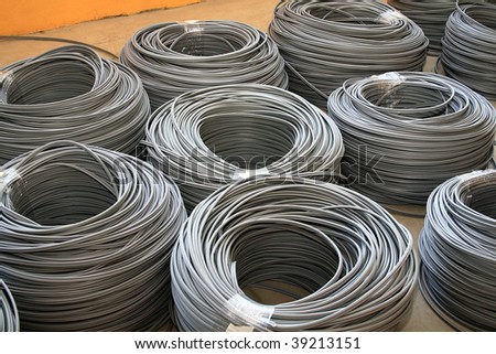 Some piles of gray industrial cables