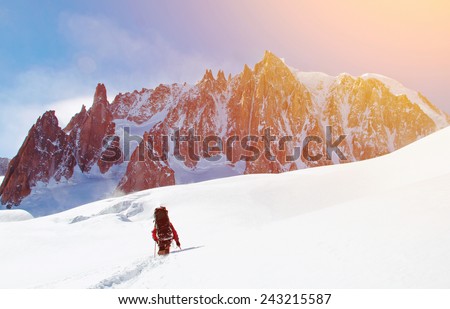 Extreme Sport. Lone hikers in winter mountains