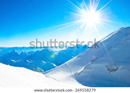 Nature background. Beautiful Sunrise in winter mountains