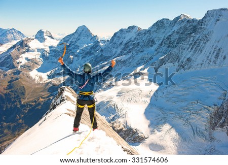 Group of  climbers reaching the summit, Nepal Himalayas
