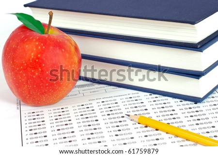Test score sheet with apple and books