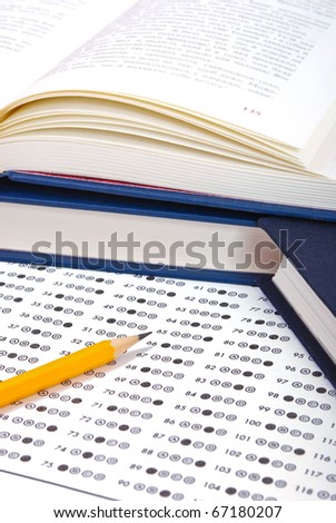 Test score sheet with answers and books