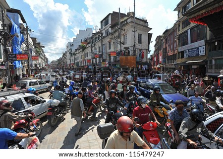 KATHMANDU - OCT 9: Traffic jam and air pollution in central Kathmandu on October 9, 2012 in Kathmandu, Nepal.Kathmandu valley is expected to pass 2 million vehicles on its roads by the end of the year