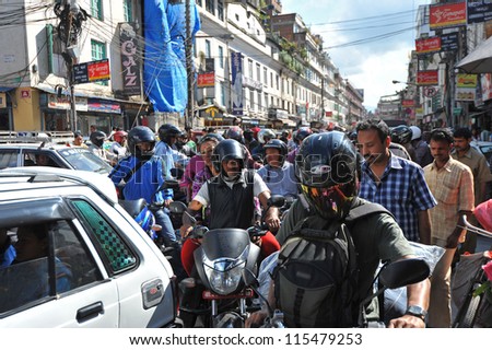 KATHMANDU - OCT 9: Traffic jam and air pollution in central Kathmandu on October 9, 2012 in Kathmandu, Nepal.Kathmandu valley is expected to pass 2 million vehicles on its roads by the end of the year