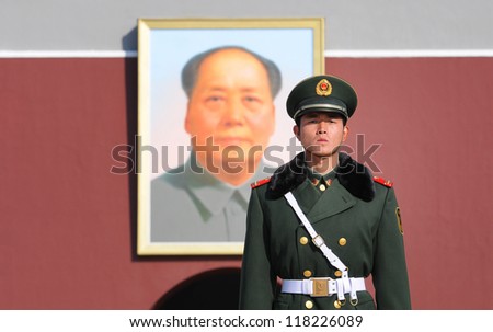 BEIJING - NOV 6: Soldier stands guard in Tiananmen area ahead of China\'s 18th National Congress on November 6, 2012 in Beijing, China.This year security is extra tight because of leadership transition