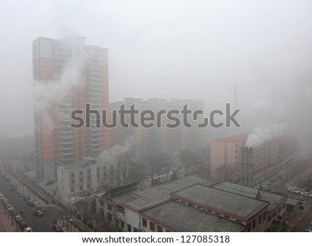 Beijing - Jan 12: Severe Air Pollution On January 12, 2013 In Beijing, China. Air Quality Index Levels Were Classed As &Quot;Beyond Index&Quot; (Pm 2.5 Of Over 700 Micrograms Per Cubic Meter).