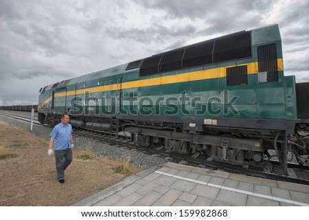 LHASA - JUNE 2: Personnel of the Qinghai-Tibet railway company inspects the train on June 2, 2013 in Lhasa, Tibet. This train operates on the world\'s highest (5,072 m) high altitude railway track.