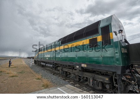 LHASA, TIBET - JUNE 2: Personnel of the Qinghai-Tibet railway company inspects the train on June 2, 2013 in Lhasa, Tibet. This train operates on the world\'s highest (5,072 m) high altitude railway track.