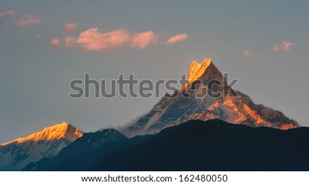 Himalayan mountain peak during sunset ( Machapuchare or Fishtail peak in Nepal )