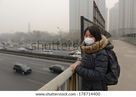 BEIJING - FEB 25: severe air pollution on February 25, 2014 in Beijing, China. Air quality index levels were classed as \