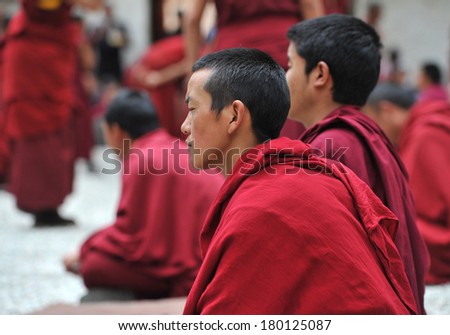 LHASA - MAY 2: Unidentified monk engaged in meditation at Drepung monastery on May 2, 2013 in Lhasa, Tibet. Meditation is part of the monastery curriculum to become a higher lama.