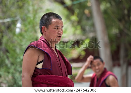 LHASA - MAY 1: Unidentified monks debate at Sera monastery on May 1, 2013 in Lhasa, Tibet. Debating is part of the monastery curriculum to become a higher lama.