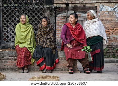 BHAKTAPUR - OCTOBER 24: people watch the religious parade during Tihar Festival on Taumadhi Square on October 24, 2014 in Bhaktapur, Nepal. Tihar one of Nepal\'s important religious festivals.